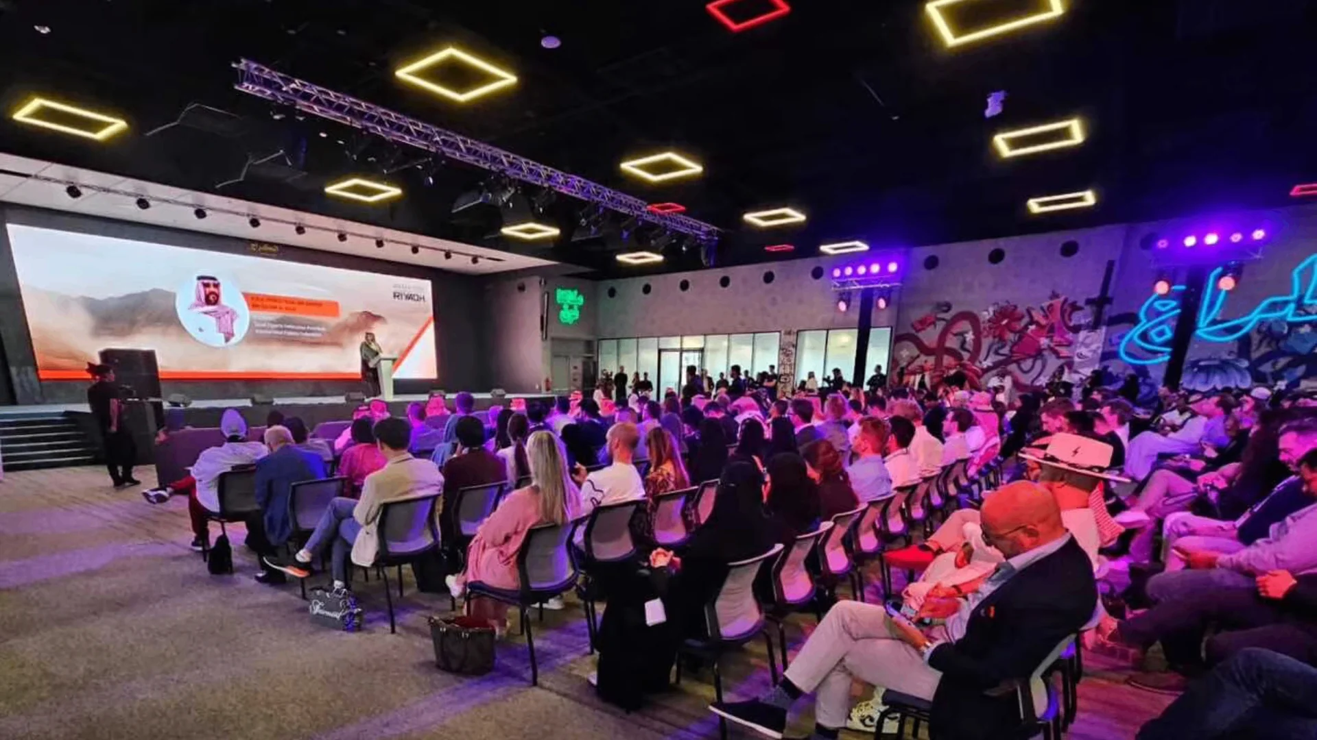 Audience watching a keynote at an Outer Edge event in Riyadh